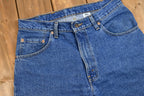 Vintage 1990s Levi's 560 Medium Wash Loose Fit Tapered Leg Mom Jeans