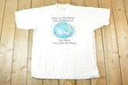 Vintage 1990s Where In The World Does Delta Go Souvenir T-Shirt Men's L