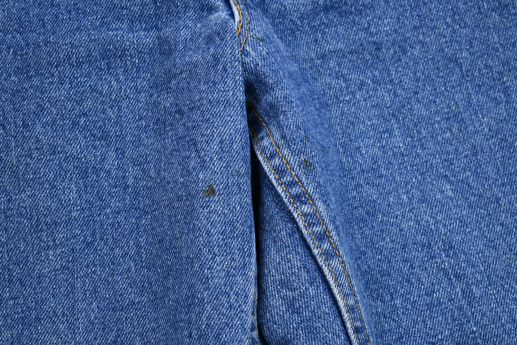 Vintage 1990s Levi's 560 Medium Wash Loose Fit Tapered Leg Mom Jeans