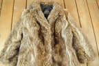 Vintage 1970s Ross Furs Adjustable Length Brown Raccoon Fur Coat