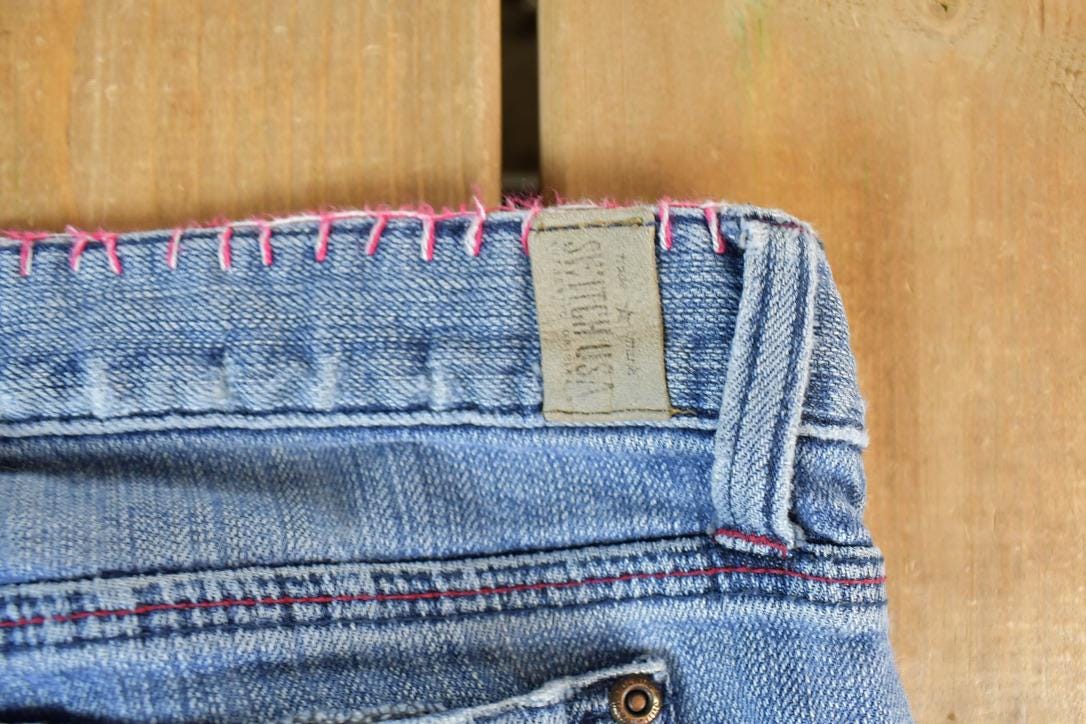 Vintage 1990s Switch USA Patched Denim Bell Bottoms Jeans Size 30 x 32