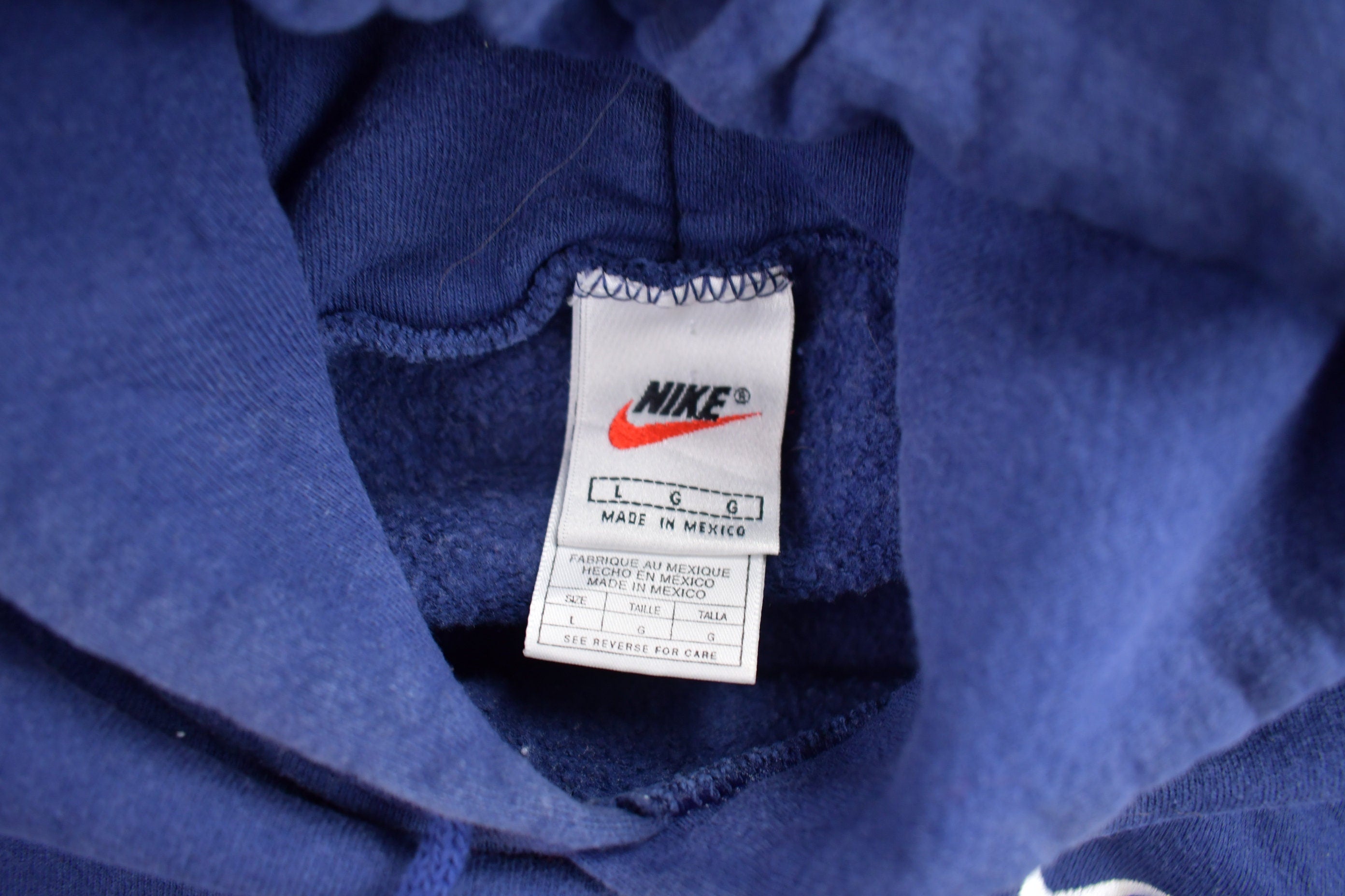Vintage 1990s Nike Embroidered Mini Swoosh Blue Hoodie