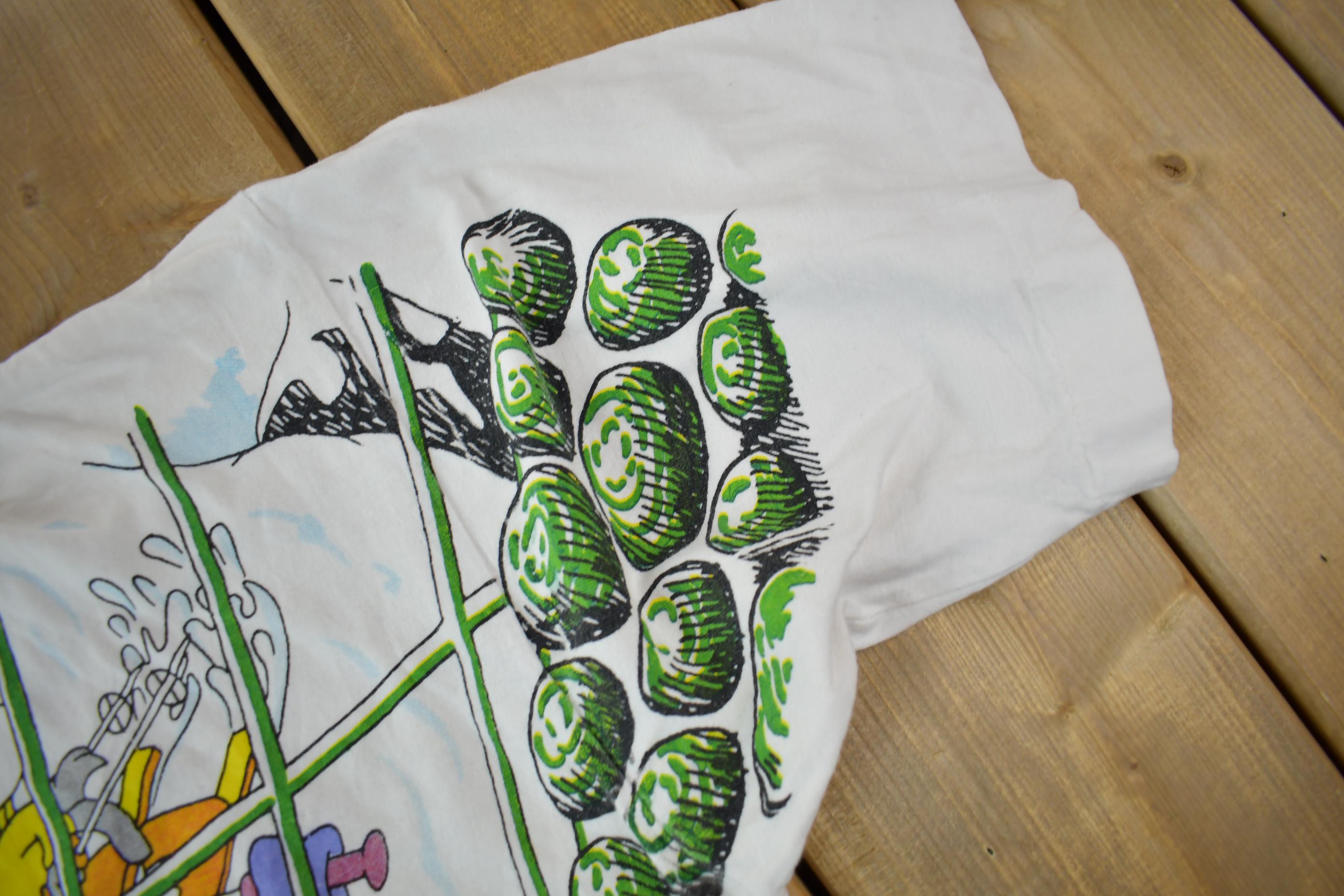 Vintage 1990s Tiny Tunes Destination Alps All Over Print Graphic T-Shirt  Warner Bros  Looney Tunes  3XL  CUT NECK