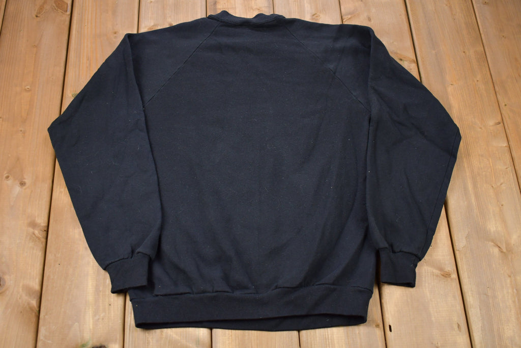 Vintage 1994 Warner Bros Looney Tune House Graphic Crewneck Sweatshirt
