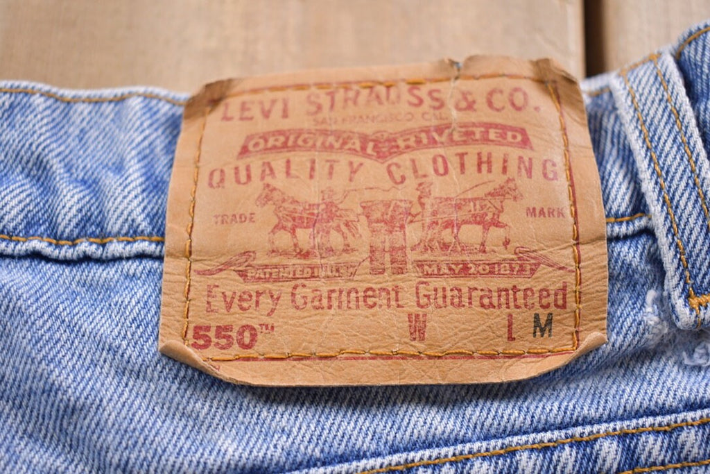 Vintage 1990s Levi's 550 Red Tab Denim Jeans Size 34 x 31