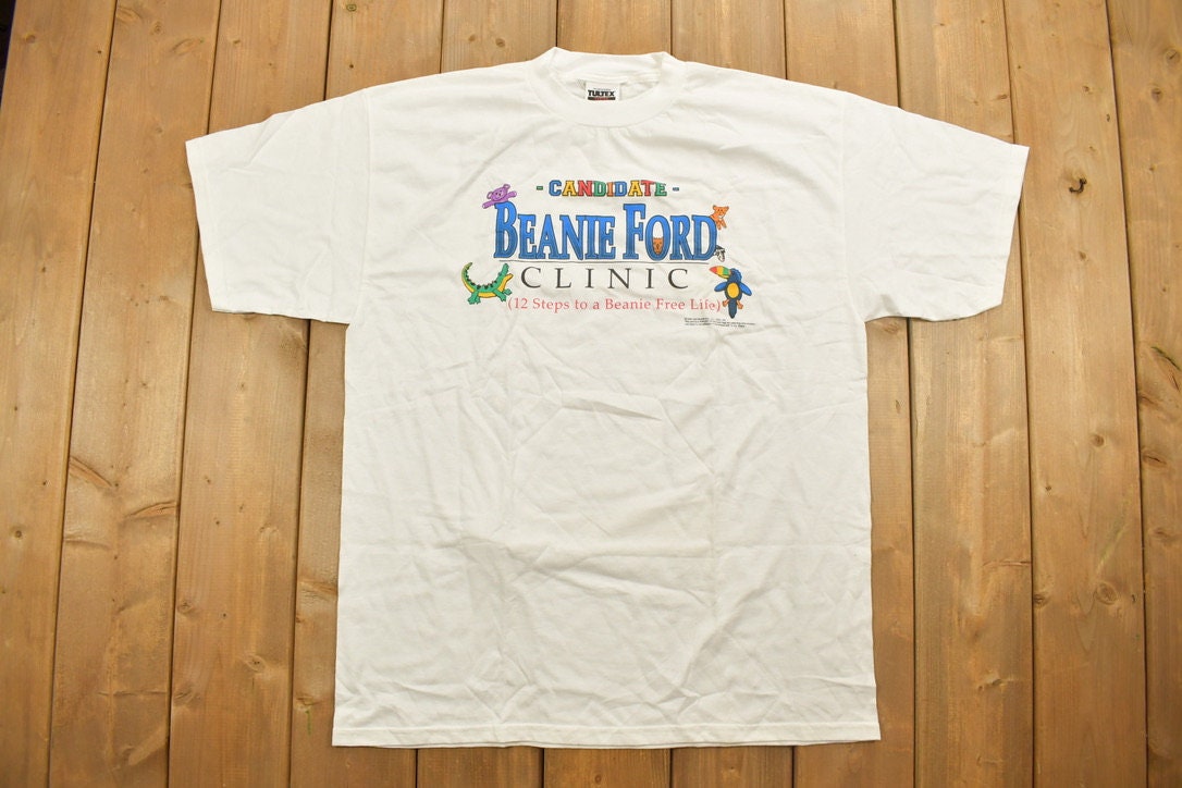 Vintage 1990s Beanie Ford Clinic Parody Graphic T-Shirt