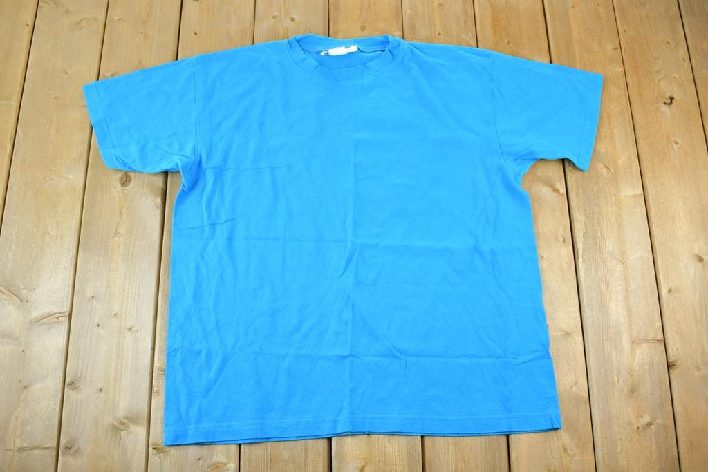 Vintage 1990s Blank Sky Blue Souvenir Single Stitch Graphic Print T-Shirt /