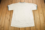 Vintage 1990s Starter Graphic Ringer T-Shirt