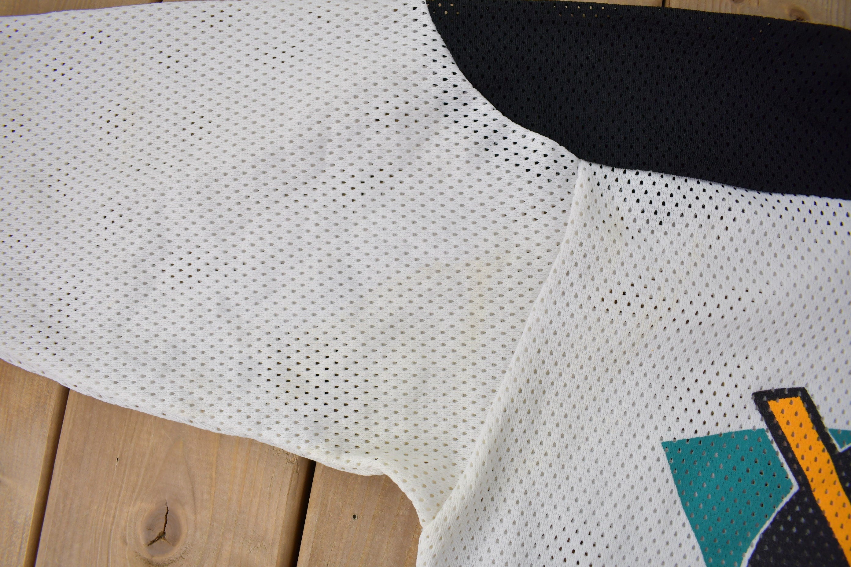 Vintage 1990s Anaheim Mighty Ducks NHL Ravens Hockey Jersey Made In Canada Size Youth Large