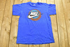 Vintage 1990s Nike Grey Tag Graphic T-Shirt