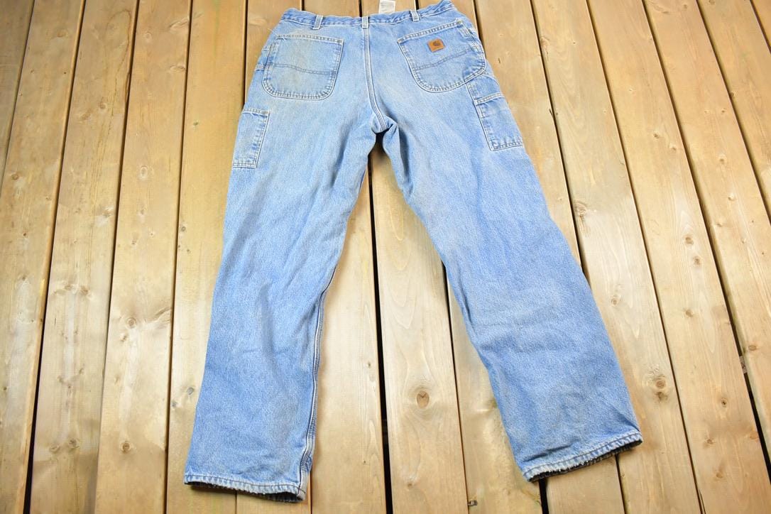 Vintage 1990s Carhartt Lined Denim Work Jeans Size 36 x 34 Made In USA