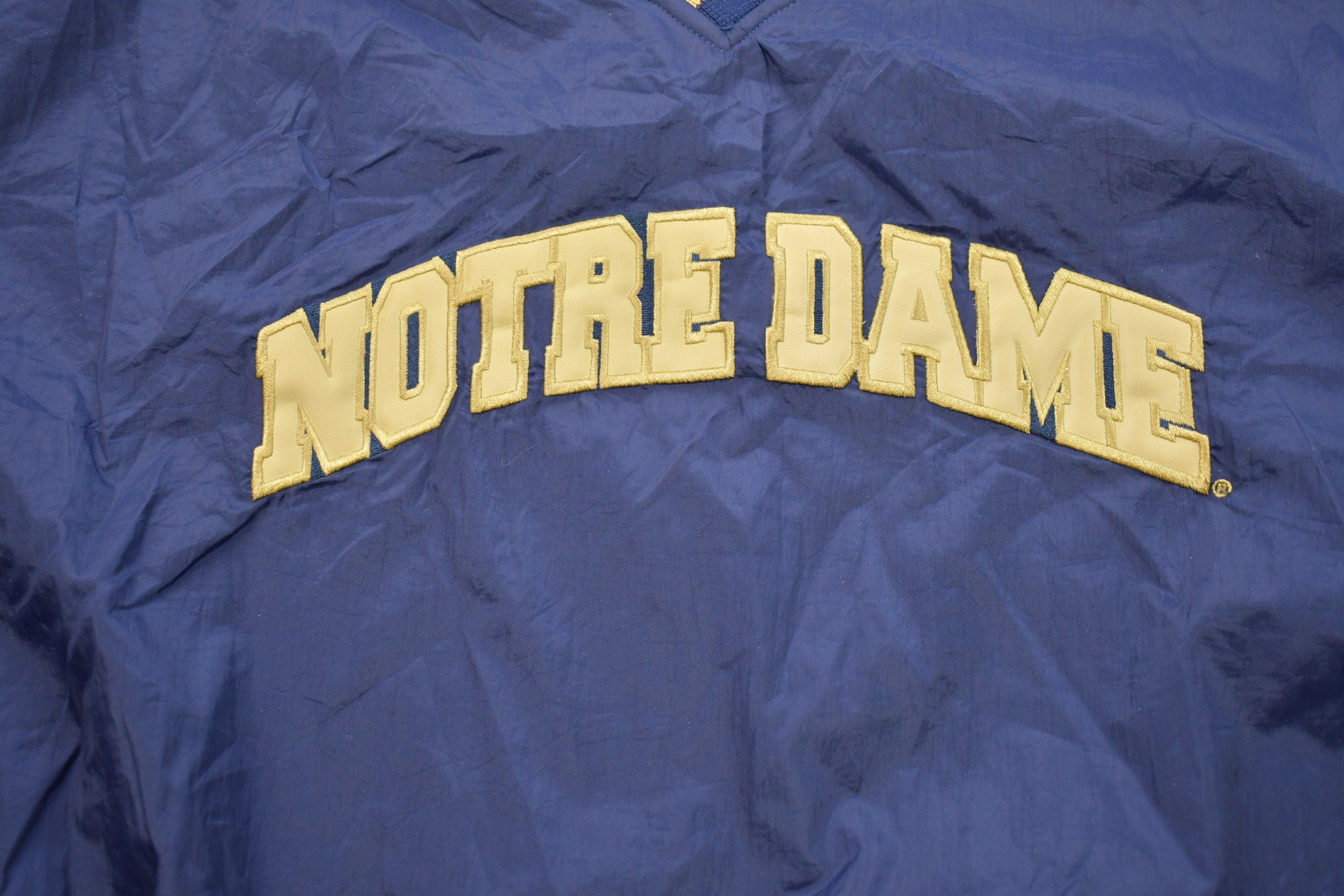 Vintage 1990s Champion Notre Dame Graphic Windbreaker Jacket