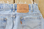 Vintage 1990s Levi's 560 Loose Tapered Denim Jeans Men's 26 x 31 / 90s Levi's / Distressed Sun Faded Jeans
