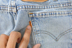 Vintage 1990s Levi's 560 Loose Tapered Denim Jeans Men's 26 x 31 / 90s Levi's / Distressed Sun Faded Jeans