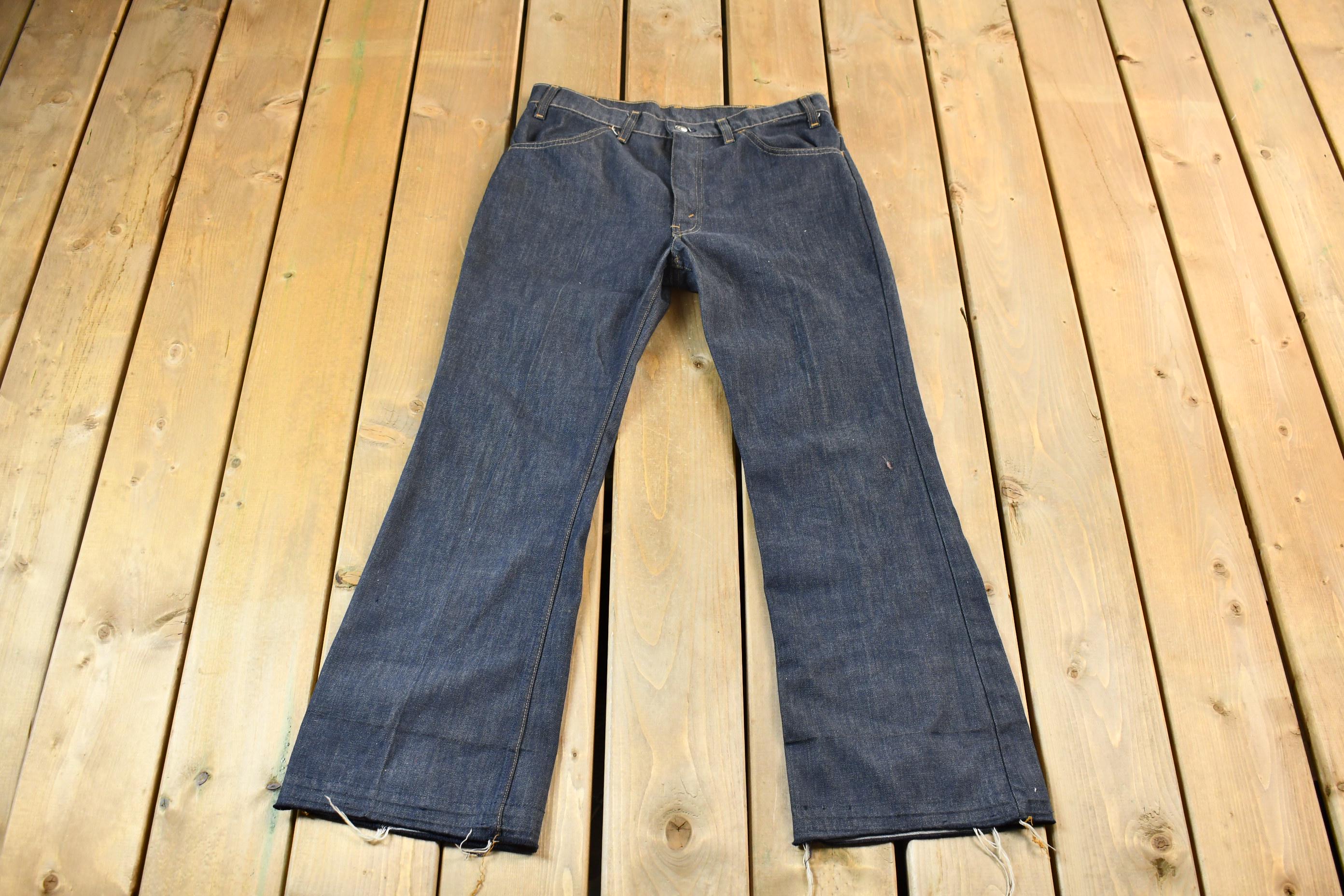Vintage 1990s Dark Wash Levi's Bell Bottom Orange Tab Flare Jeans Size 32 x 28