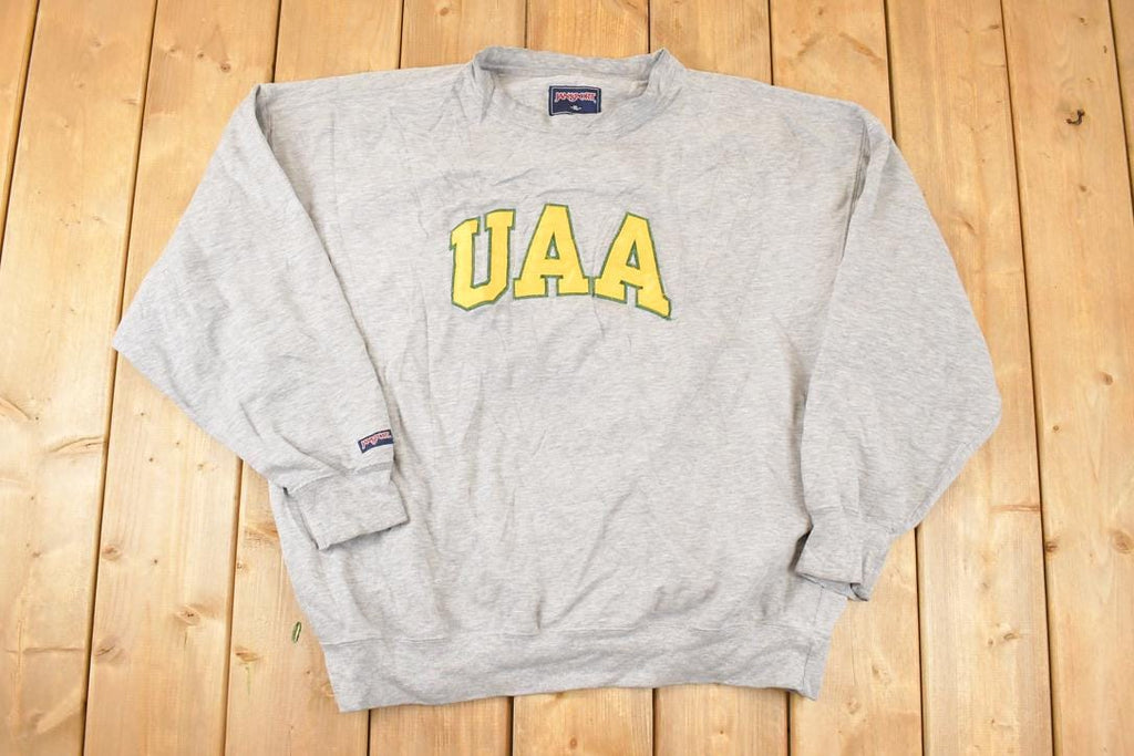 Vintage 1990s Jansport UAA Embroidered Collegiate Crewneck Sweatshirt Men's XL