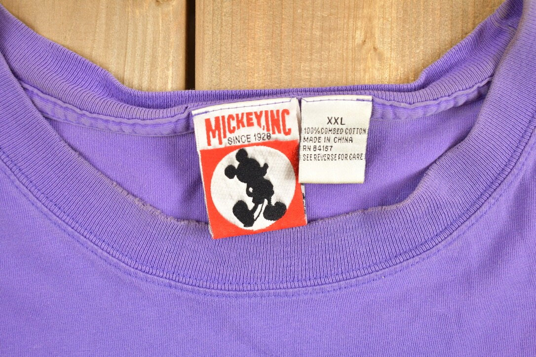 Vintage 1990s Mickey Inc Purple Walt Disney World Disney T-Shirt
