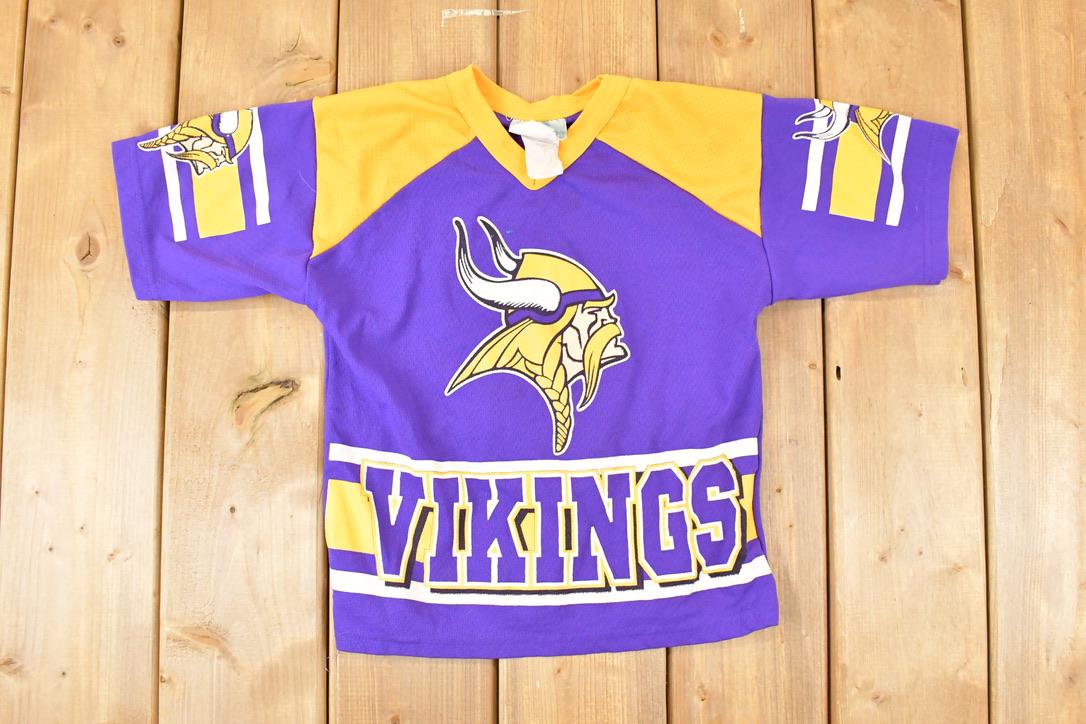 Vintage 1990s Minnesota Vikings AOP NFL T-Shirt Youth S