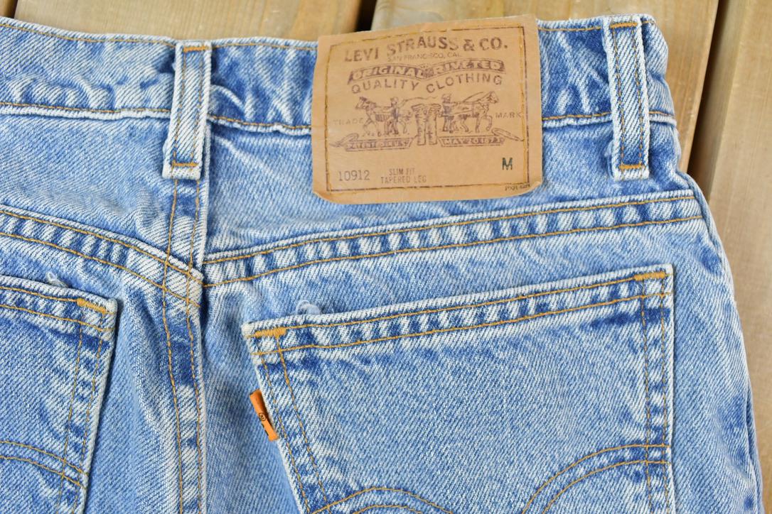 Vintage 1990s Levi Strauss 912 Orange Tab Slim Fit Tapered Leg Denim Jeans Size 28 x 28