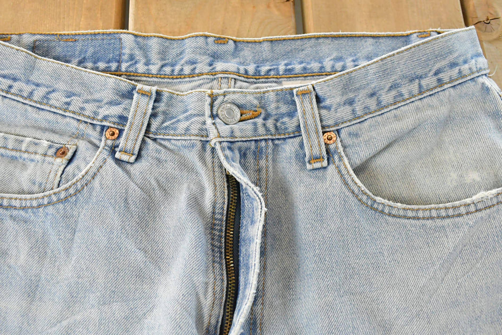 Vintage 1990s Levi's Distressed 550 Relaxed Fit Denim Jeans Men's 33 x 33 / 90s Levi's / Blown Out Sun Faded Jeans