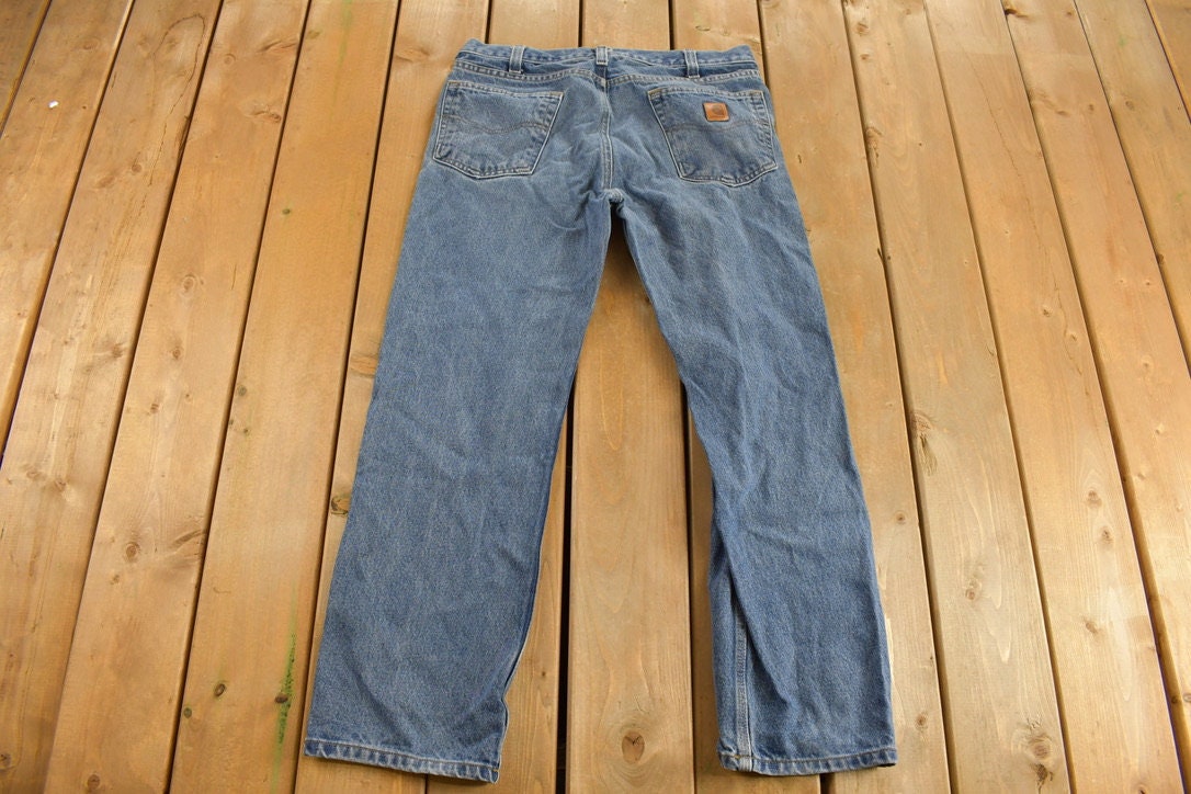 Vintage 1990s Carhartt Medium Wash Denim Jeans Size 34 x 30
