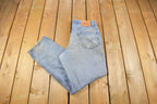 Vintage 1990s Levi's 550 Relaxed Fit Light Wash Jeans Size 34 x 30