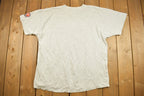 Vintage 1990s The Grind Line Detroit Red Wings NHL Graphic T-Shirt