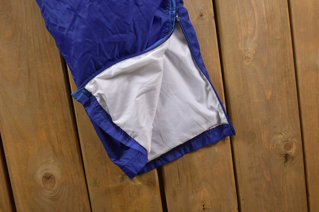 Vintage 1990s Blue Nike Mini Swoosh Track Pants Size L