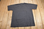 Vintage 1990s FOHKENGRÜVEN Graphic T Shirt