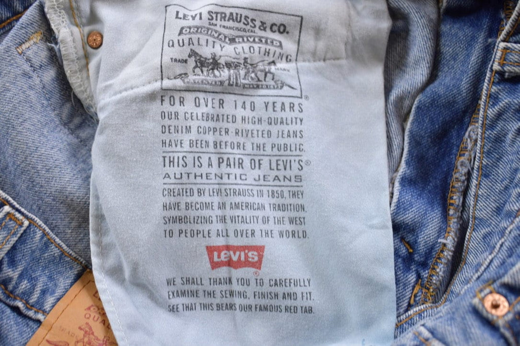 Vintage 1990s Levi 550 Red Tab Jeans Size 36 x 29