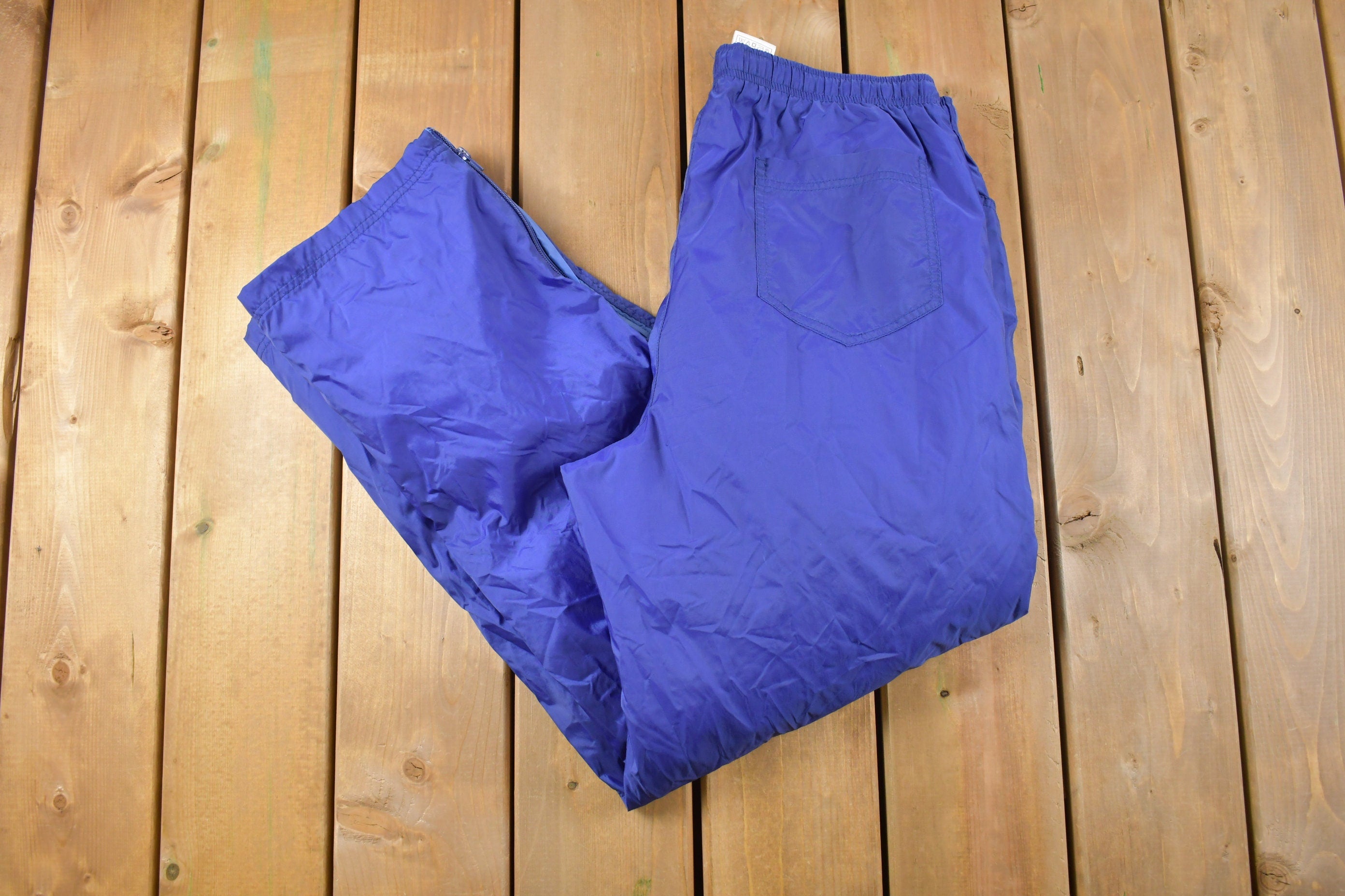 Vintage 1990s Blue Nike Mini Swoosh Track Pants Size L