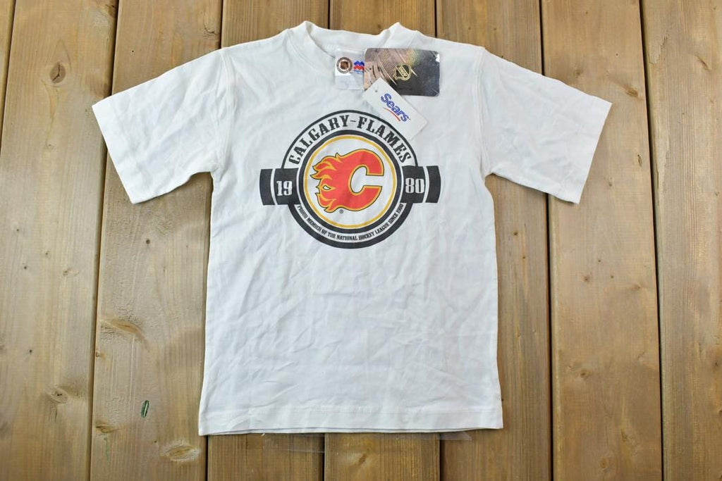 Vintage 1990s Deadstock Youth Calgary Flames NHL Graphic T-Shirt  Made In USA  Single Stitch  NHL Hockey  90s Streetwear  Sportswear