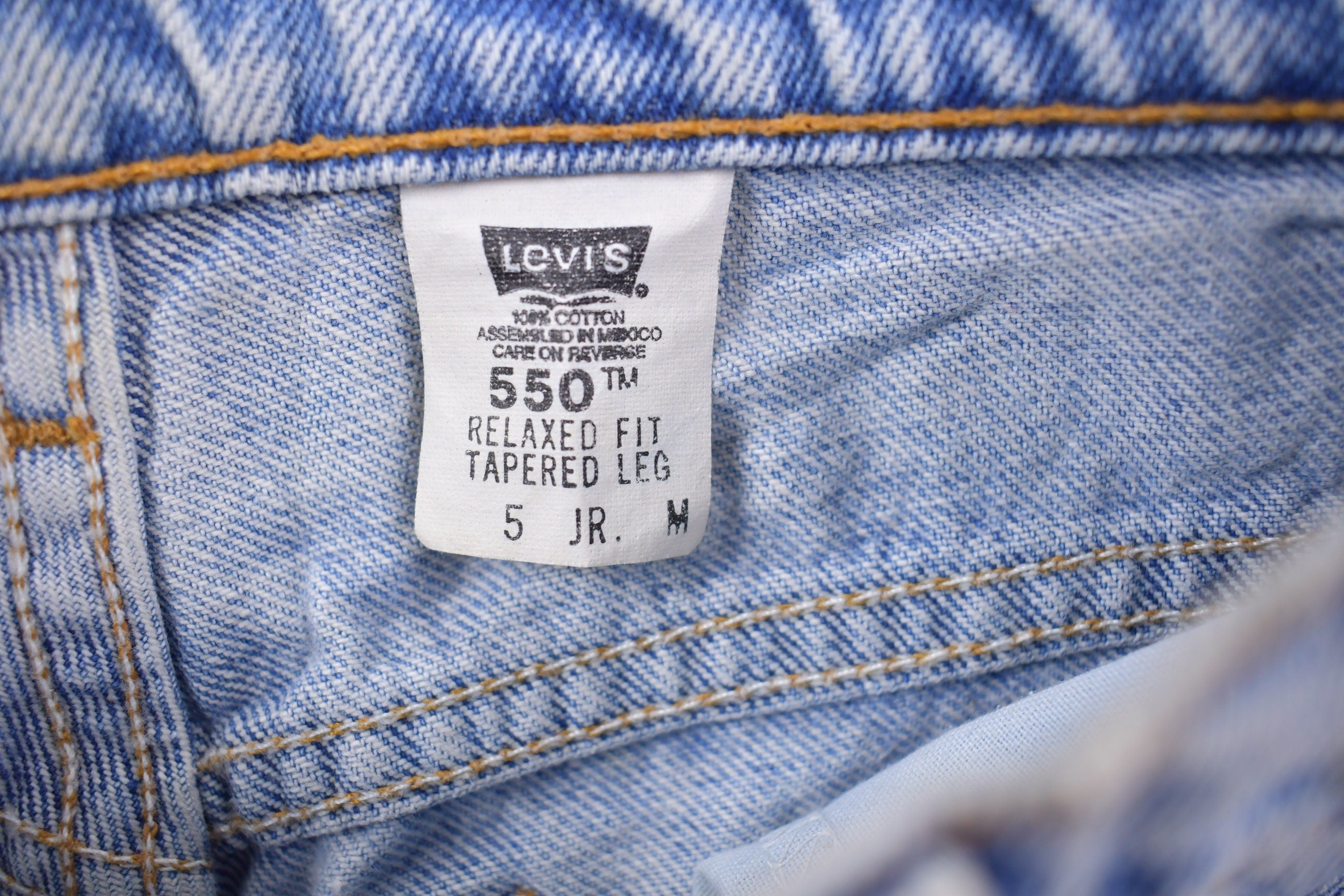 Vintage 1990s Levi's 550 Red Tab Light Wash Jeans Size 26 x 29
