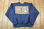 Vintage 1990s Coleman World Adventures Crewneck Sweatshirt
