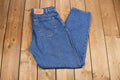 Vintage 1990s Levi's 560 Medium Wash Loose Fit Tapered Leg Mom Jeans