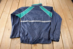 Vintage 1990s Blue & Green Champion Small Logo Windbreaker Jacket Size Small