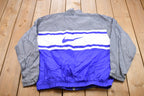 Vintage 1990s Nike Embroidered Swoosh Windbreaker Jacket