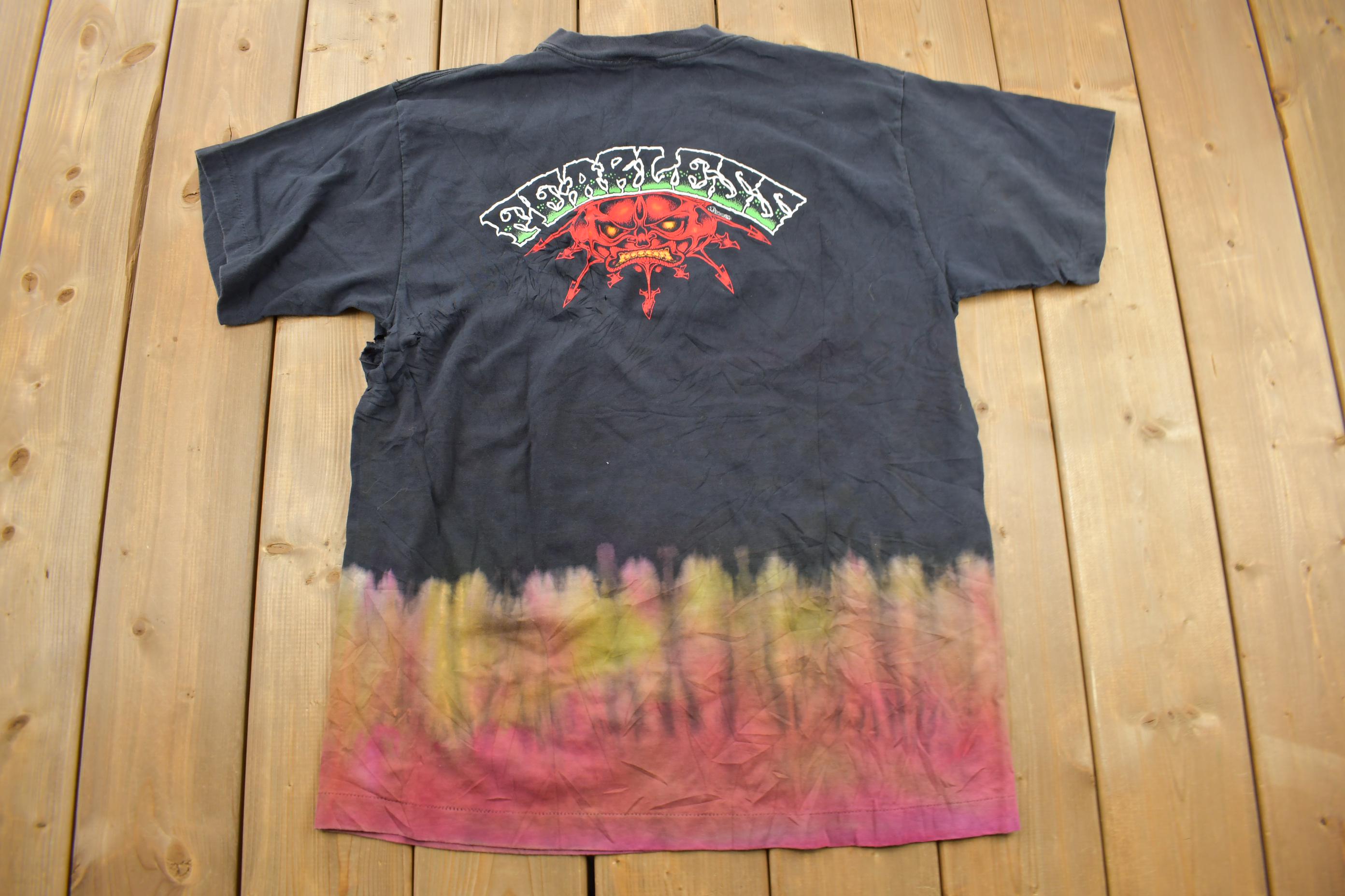 Vintage 1990s FEARLESS All Over Print Skull Graphic T-Shirt