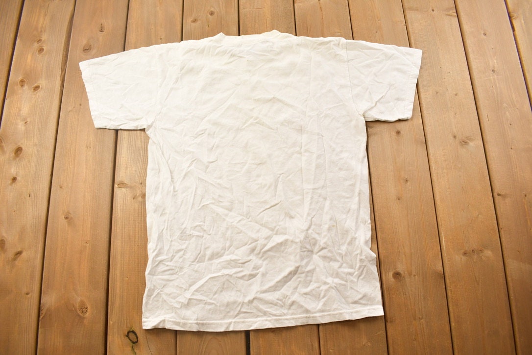 Vintage 1990s Theory Of Evolution Scuba Graphic T Shirt