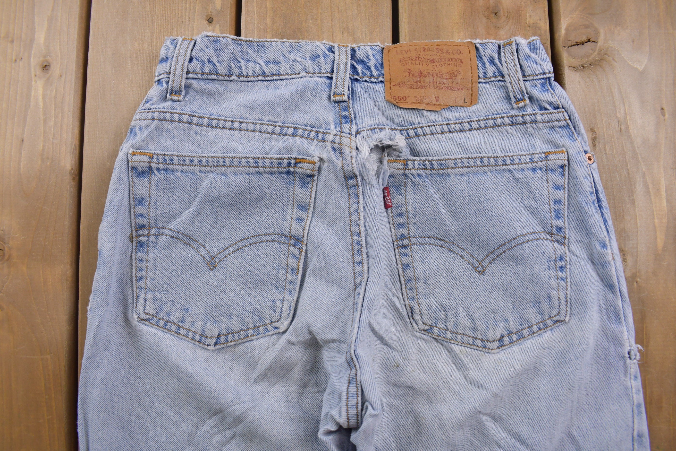 Vintage 1990s Levi's 550 Red Tab Distressed Jeans Size 26 x 32