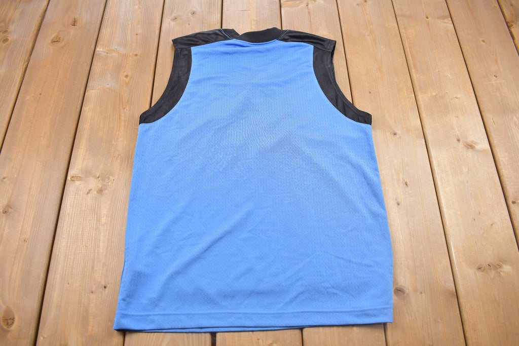 Vintage 1990s UNC Nike Basketball Graphic Youth Jersey