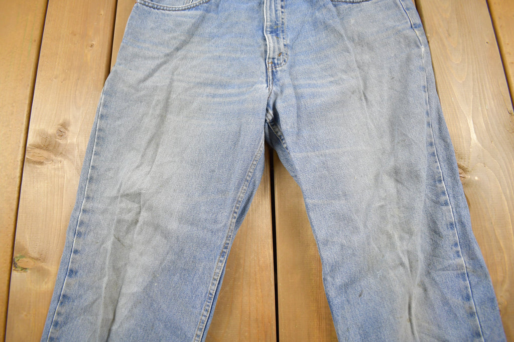 Vintage 1990s Levi's 550 Relaxed Fit Light Wash Jeans Size 34 x 30