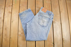 Vintage 1990s Levi's 565 Red Tab Denim Jeans Size 38 x 30 / Blue / Light Wash / Vintage Denim / Made In USA / 90s Levi's / Distressed