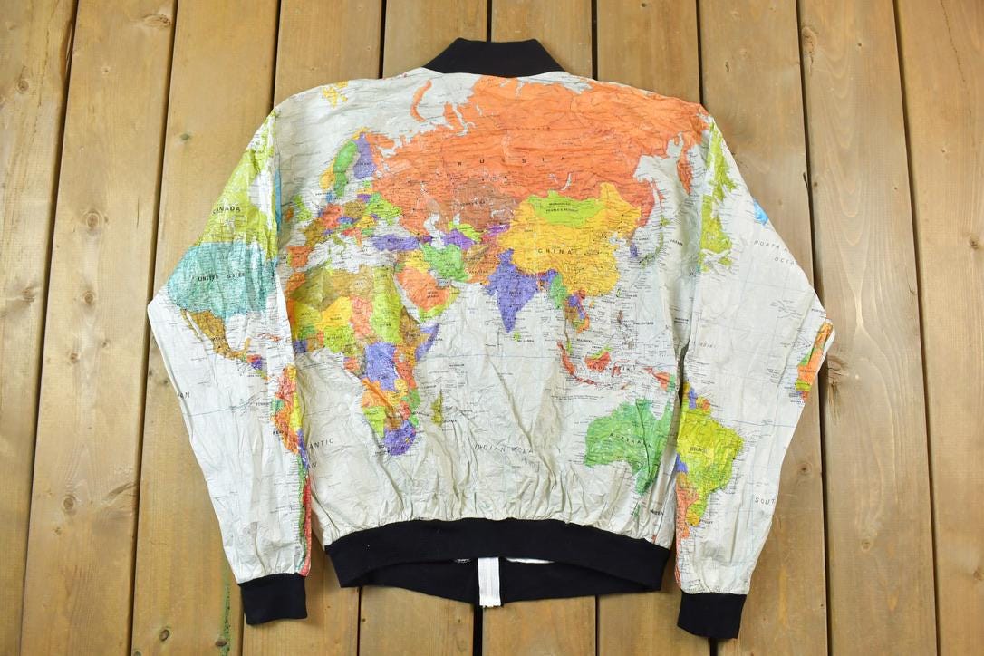 Vintage 1990s Wearin The World All Over Print World Map Full Zip Windbreaker Jacket