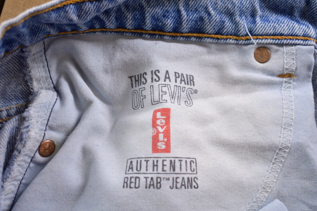 Vintage 1990s Levi's 550 Red Tab Denim Jeans Size 34 x 31