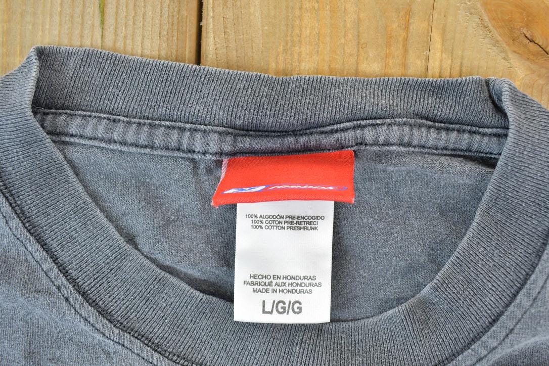 Vintage 1990s Tennessee Titans NFL Graphic T-Shirt