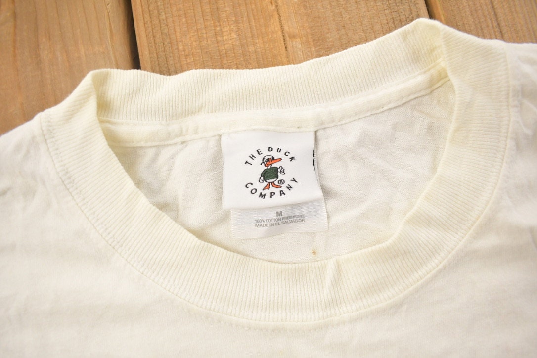 Vintage 1990s Theory Of Evolution Scuba Graphic T Shirt