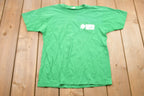 Vintage 1990s Straders Nursery & Farm Market Graphic T-Shirt