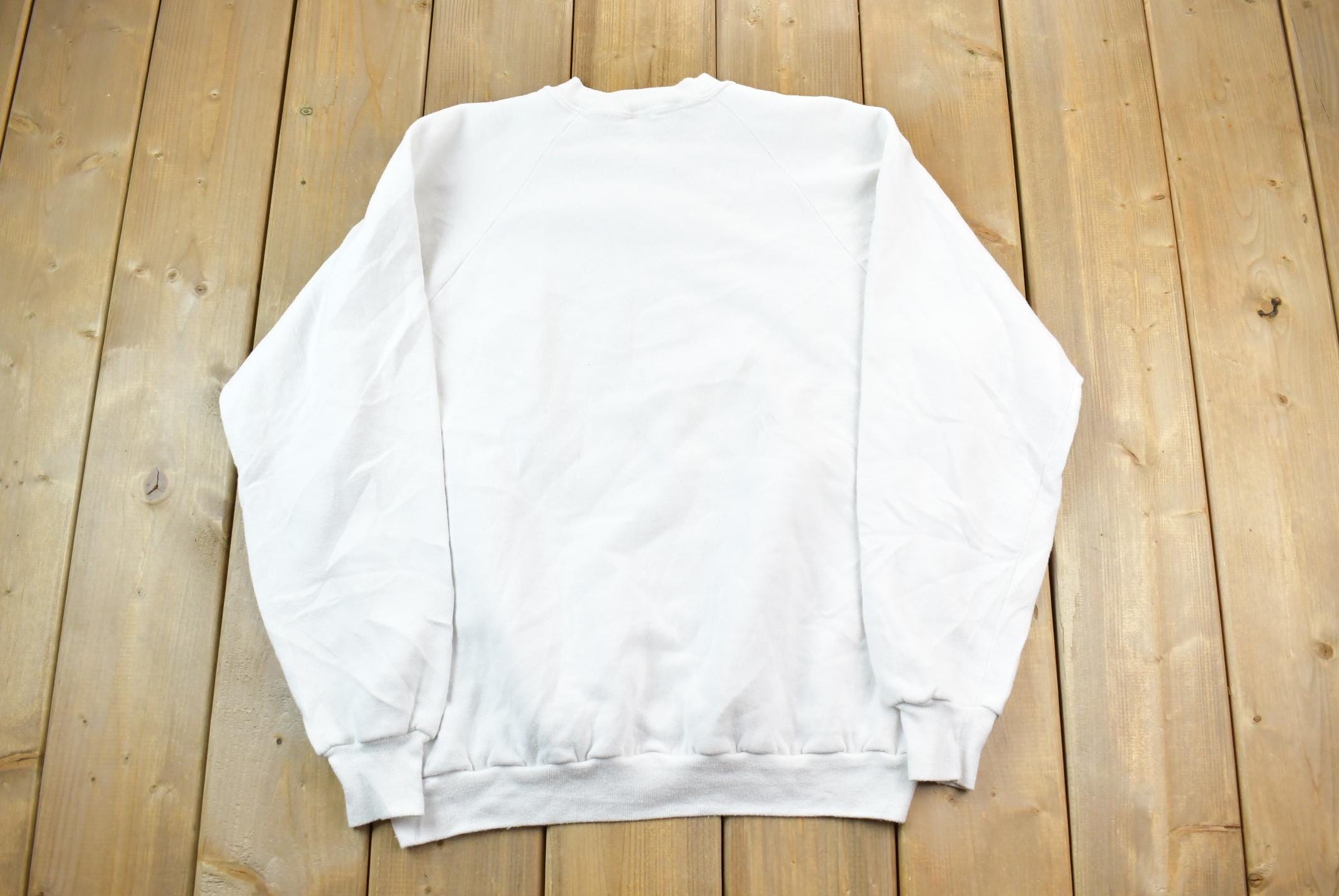 Vintage 1986 Squiggle Hair Guy Story Print Crewneck Sweatshirt
