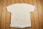 Vintage 1990s Cleveland Browns Champion NFL Graphic T-Shirt